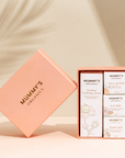 New Mum Gift Box on a warm beige studio background.