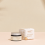 Organic Citrus Lip Balm on a warm beige studio background.