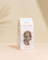 Organic Colic Soothe Tea on a beige and peach background.